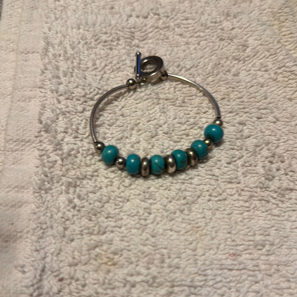 Silver Tone and Real Turquoise Beaded Bracelet
Tested with acetone